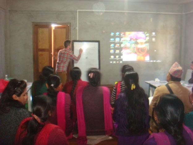 Volunteer giving teacher training