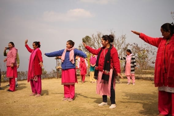 Playing ‘Fishy, fishy’ with teachers outside